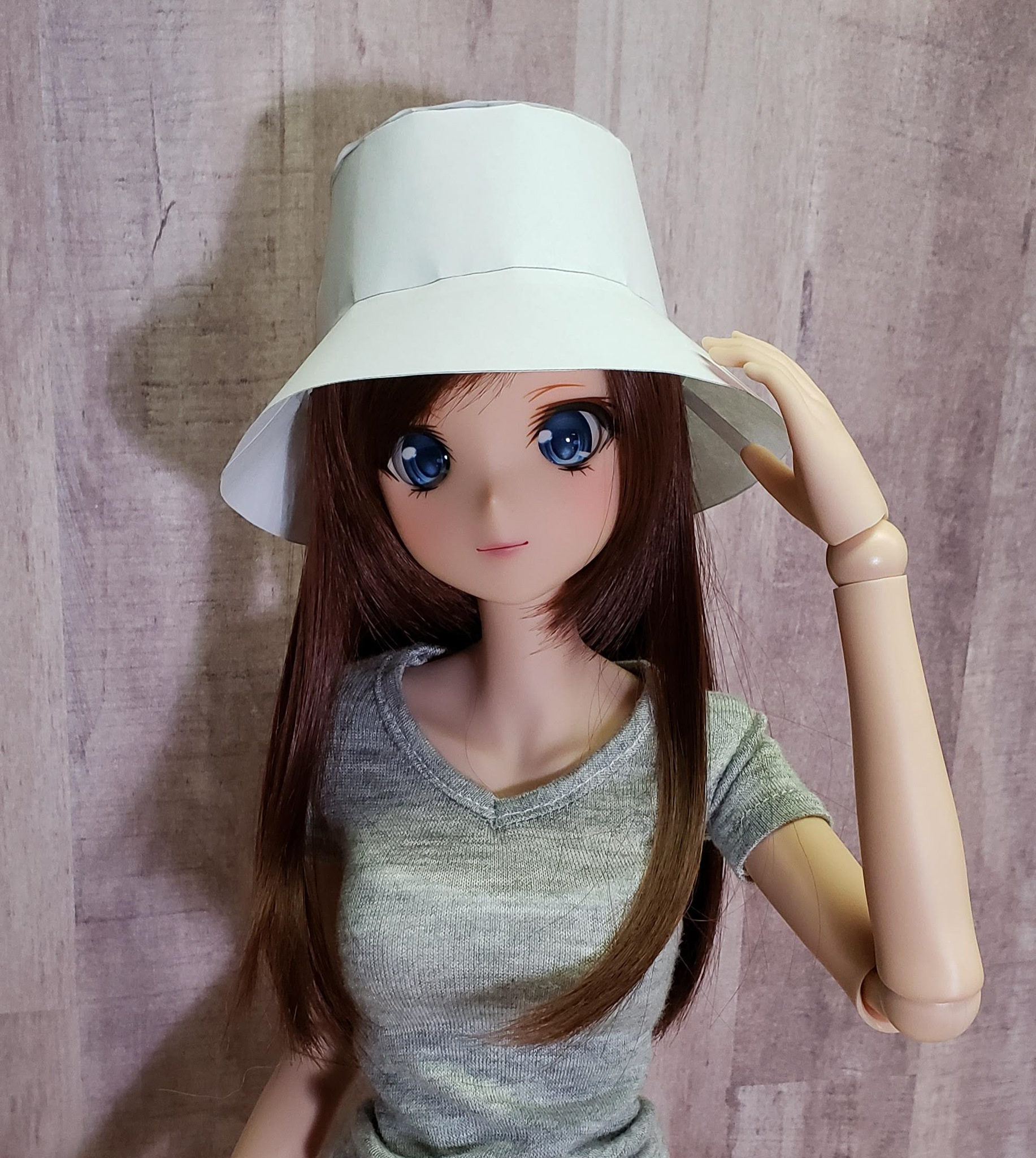 My Smart Doll Starlight Maya wearing a papercraft test hat.